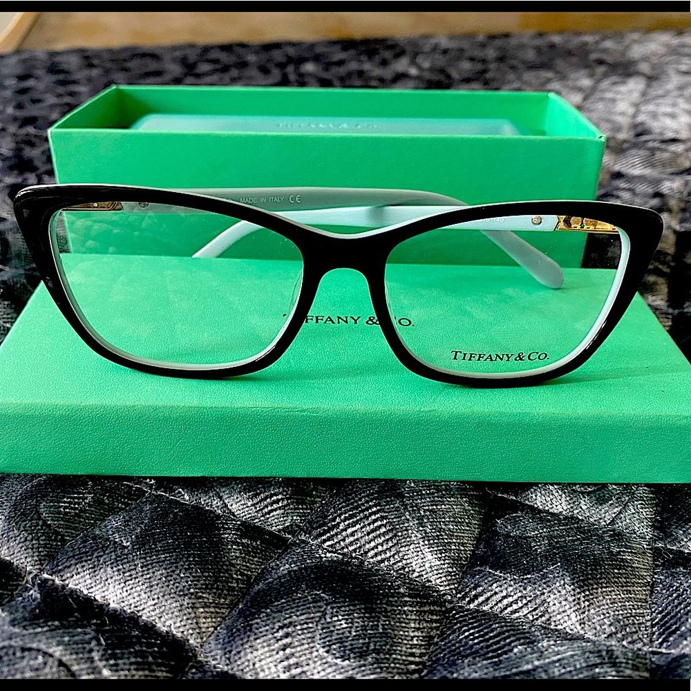 Find these babies if you can! Tiffany & Co Black and Blue with GOLD!